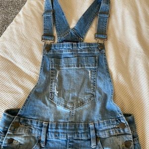 Blue overalls. Size 7 in womens.